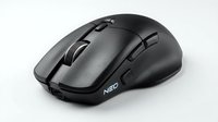 Ergonomic black gaming mouse with multiple programmable buttons and textured grip, isolated on white background for web and product design use.