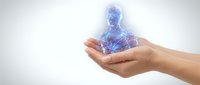 Human hands holding glowing blue digital human figure with neural network connections, representing technology, innovation, artificial intelligence, and future digital transformation concepts.