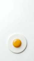 Fresh fried egg with golden yolk isolated on white background for cooking and breakfast design projects.