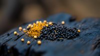 Aromatic spices scattered on rustic wooden surface with warm golden lighting creating culinary atmosphere for cooking and food preparation concepts.