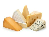Assorted cheese wedges including cheddar, brie, emmental and blue cheese varieties isolated on white background for food and culinary design projects.