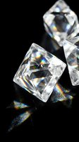 Clear crystal diamonds with rainbow light reflections on black surface creating prismatic spectrum effects for luxury jewelry and gemstone concepts.