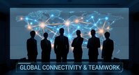 Business professionals silhouettes standing before illuminated world map with network connections representing global teamwork and international collaboration.