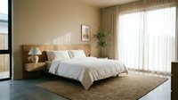 Serene bedroom interior with wooden bed frame, white linens, neutral tones, natural light from sheer curtains, potted plant, and textured area rug for home decor inspiration.
