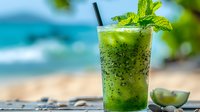 Refreshing green mojito cocktail with mint leaves and lime against tropical beach background, perfect for summer drink menus.