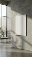 Minimalist interior with blank white frame on textured concrete wall, natural light casting shadows through large window for modern home decor mockup.