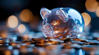 Glass piggy bank on scattered coins with warm bokeh lights in background creating magical financial atmosphere. Money saving concept with transparent design.