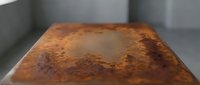 Rusty metal surface with oxidized patina and weathered texture, suitable for industrial design, backgrounds, and grunge effects.