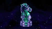 Translucent glass chess knight piece with green and purple lighting effects against starry space background for strategic gaming concepts.