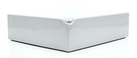 White luxury gift box with silver ribbon bow isolated on white background for premium packaging and special occasions.