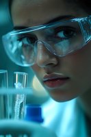 Young female scientist in protective eyewear examining test tubes in laboratory with dramatic blue lighting, focused on chemical research and analysis.