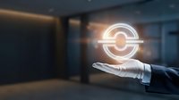 Businessperson holding glowing target symbol in palm, representing goal achievement, success strategy, and business focus in modern office environment.