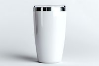 White travel mug with silver lid isolated on light background. Modern minimalist reusable coffee cup design for eco-friendly lifestyle and sustainable living.