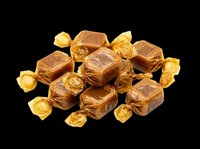Wrapped caramel candies pile isolated on transparent background, ready for stickers, t-shirt design, print on demand, sublimation, and clipart use.