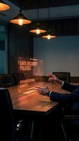 Business professional interacting with holographic data security interface in modern office meeting room with pendant lighting for corporate technology presentations.