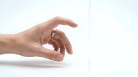 Male hand making pinching gesture on white background isolated for design and commercial use.