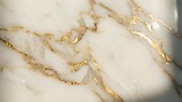 Cream and gold marble texture with luxurious veining pattern, suitable for backgrounds, wallpapers, and elegant design projects.