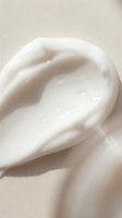 Luxurious white cream texture with smooth swirl pattern for skincare and cosmetic product applications in beauty industry marketing materials.