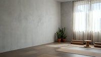 Minimalist yoga studio interior with exercise mat on wooden floor, snake plant decoration and natural window light for meditation and wellness practice.