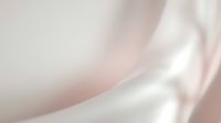Soft pink and white silk fabric with elegant flowing curves and gentle waves creating luxurious textile background for fashion and beauty projects.
