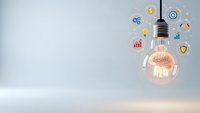 Glowing light bulb with colorful business icons floating around representing innovation, creativity, and entrepreneurial ideas on clean background.
