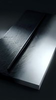 Closed notebook with black pen on dark textured surface, minimalist monochrome composition for business, education, and creative projects.