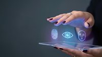 Woman with purple manicure holding tablet displaying holographic biometric security icons including fingerprint, eye scan, and facial recognition technology.