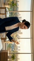 Professional businesswoman using holographic digital interface technology in modern office environment for futuristic business solutions.