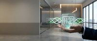 Businessman hand holding digital healthcare icon with connected network lines in modern office space with glass partition and natural light.