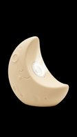 Cream-colored crescent moon toy with smiling face and glowing eye feature, isolated on transparent background ready for clipart, stickers, print-on-demand products, and sublimation designs.