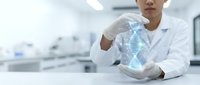 Asian male scientist in white lab coat holding glowing DNA double helix hologram in modern laboratory for genetic research and biotechnology applications.