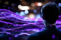 Silhouette of man observing glowing purple waves with particles and bokeh lights creating magical atmosphere. Abstract digital art concept for technology and innovation.