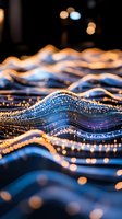 Abstract waves of glowing fiber optic lights creating dynamic pattern with bokeh effect in blue and gold colors against dark background, macro photography.