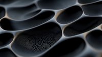 Dark metallic honeycomb macro structure with smooth curved surfaces and textured patterns creating an abstract industrial background with dramatic lighting effects.
