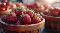 Fresh ripe strawberries in wooden bowl with natural lighting, shallow depth of field, macro food photography showing texture and details of berries.