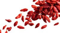 Dried goji berries scattered on white background, superfood rich in antioxidants and vitamins for healthy eating and natural medicine.