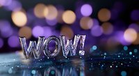 Metallic WOW text on reflective surface with purple and gold bokeh lights in background creating magical atmosphere for celebration or surprise concept.