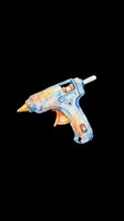 Hot glue gun isolated on transparent background, ready for clipart, t-shirt design, stickers, print-on-demand products and sublimation crafts.
