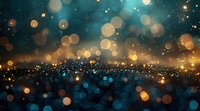 Magical bokeh lights creating dreamy atmosphere with golden and turquoise glowing particles floating in dark space, defocused sparkling background effect.