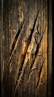 Weathered wooden surface with deep cracks and natural grain texture showing rustic aging and deterioration patterns for vintage design projects.