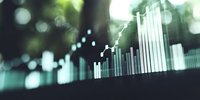 Financial data visualization showing glowing turquoise bar graph charts with bokeh light effects on dark background, representing market analysis and statistics.