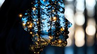Female profile silhouette with double exposure of forest landscape and magical glowing fireflies creating dreamy atmosphere against blue twilight sky.