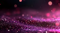 Magical pink and purple glitter particles on dark background with bokeh effect and sparkles creating dreamy abstract surface for festive designs.