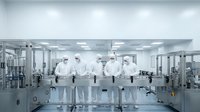 Sterile cleanroom facility with technicians in protective suits working at modern laboratory equipment for pharmaceutical manufacturing and research operations.