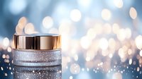Luxurious frosted glass cosmetic jar with metallic rose gold lid against blurred bokeh background, showcasing premium skincare packaging for beauty industry.