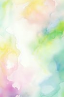 Soft pastel watercolor background with blended yellow, pink, green and blue hues creating dreamy abstract texture for spring designs and artistic projects.