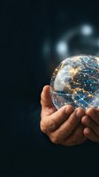 Hands holding glowing digital globe with network connections and data visualization representing global technology and connectivity solutions.