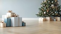 Elegant wrapped presents with silver bows arranged on wooden floor near decorated Christmas tree with warm glowing lights and soft bokeh background.