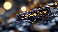 Yellow glowing text Coming Soon on dark textured surface with bokeh lights in background, dramatic cinematic announcement design for marketing.