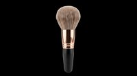 Fluffy powder makeup brush with rose gold ferrule and black handle, isolated on transparent background, ready for beauty clipart, t-shirt design, and print on demand use.